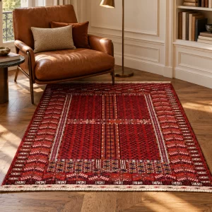 Tappeto Baluchi rosso 156 × 120 cm in un angolo lettura milanese — ambientazione virtuale